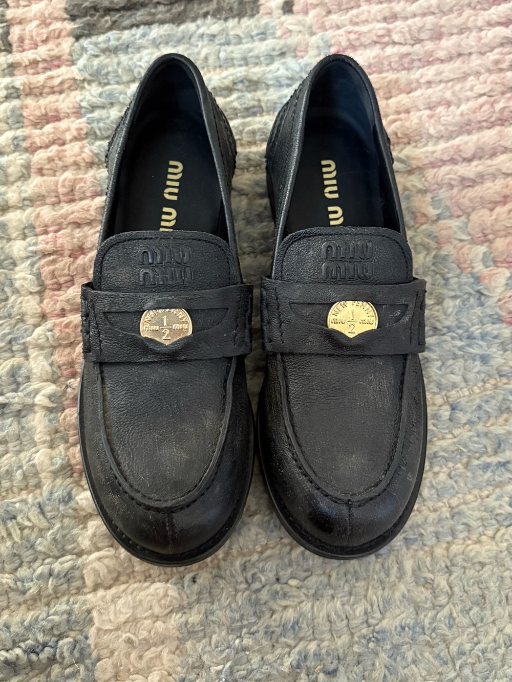 Miu Miu Black Leather Penny Loafers with Gold Coin Detail